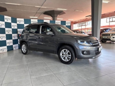 2015 Volkswagen (VW) Tiguan II 1.4 TSi BlueMotion Trend and Fun (90 kW) - ABS,AIRCON,ELECTRIC WINDOWS,PARK DISTANCE CONTROL,AIRBAGS,ALARM,PARTIAL-SERVICERECORD,RADIO,AUX,CD,SPARE KEYS. Finance available, Trade-ins welcome, Delivery country wide, T&C'S apply!!!

