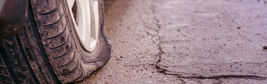 Suing-the-state-when-your-car-is-damaged-is-by-a-pothole-Main.jpg